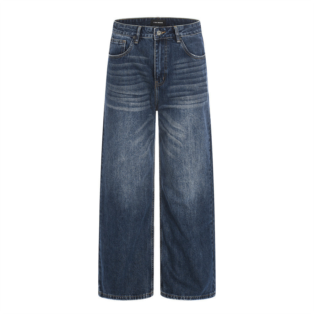 Washed dark blue denim straight-leg jeans by eprolo with faded whiskering.