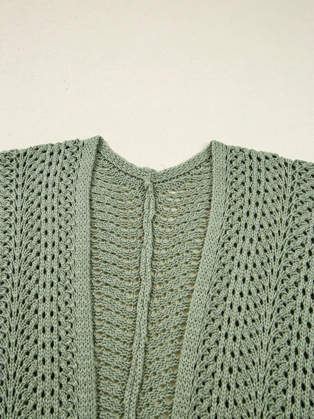 Lightweight scalloped-edge eyelet knit cardigan with batwing sleeves in sage green