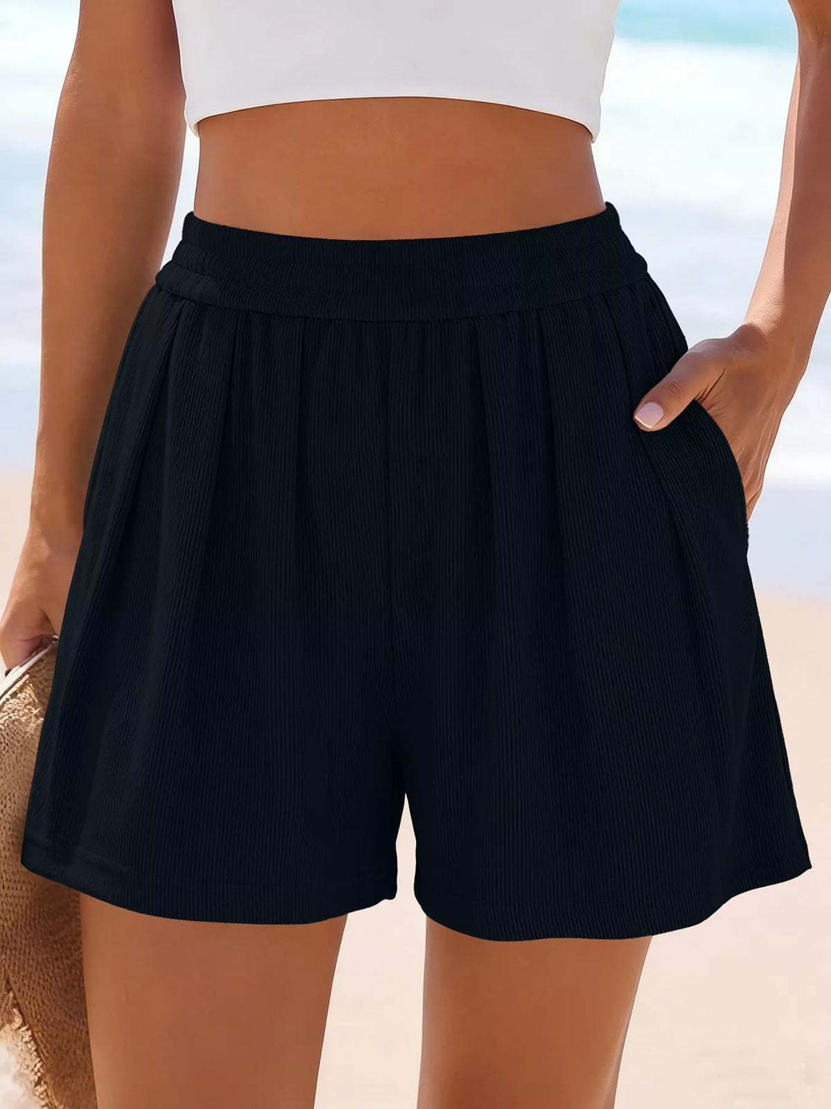 High-Waisted Ribbed Shorts in black with elastic waistband, mid-thigh length