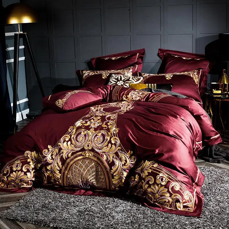 Embroidered Chinese cotton quilt cover bedding by AdTec, burgundy with ornate gold embroidery.