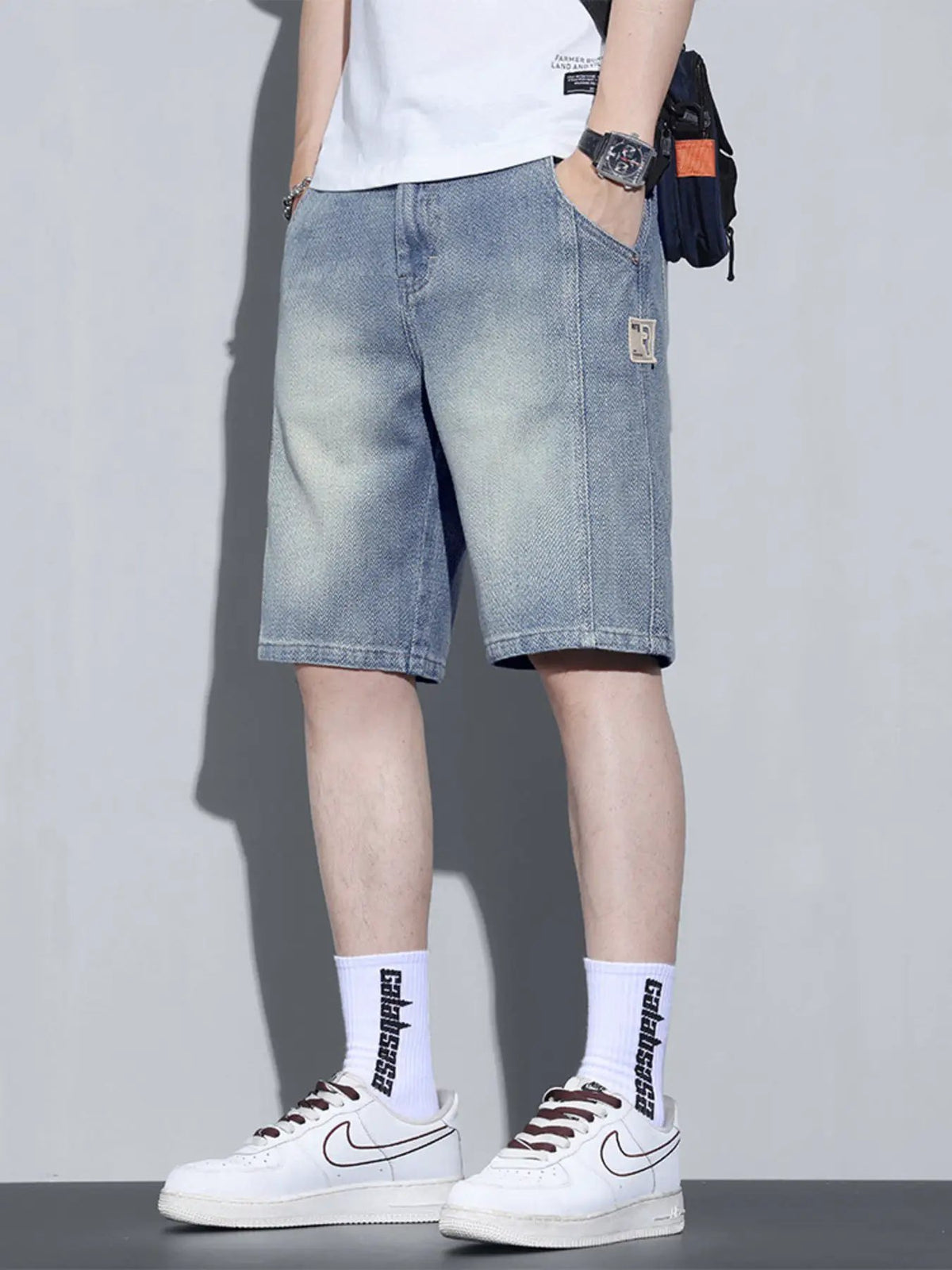 Men's Vintage Wash Relaxed Fit Denim Shorts by Trendsi, light blue knee-length denim.