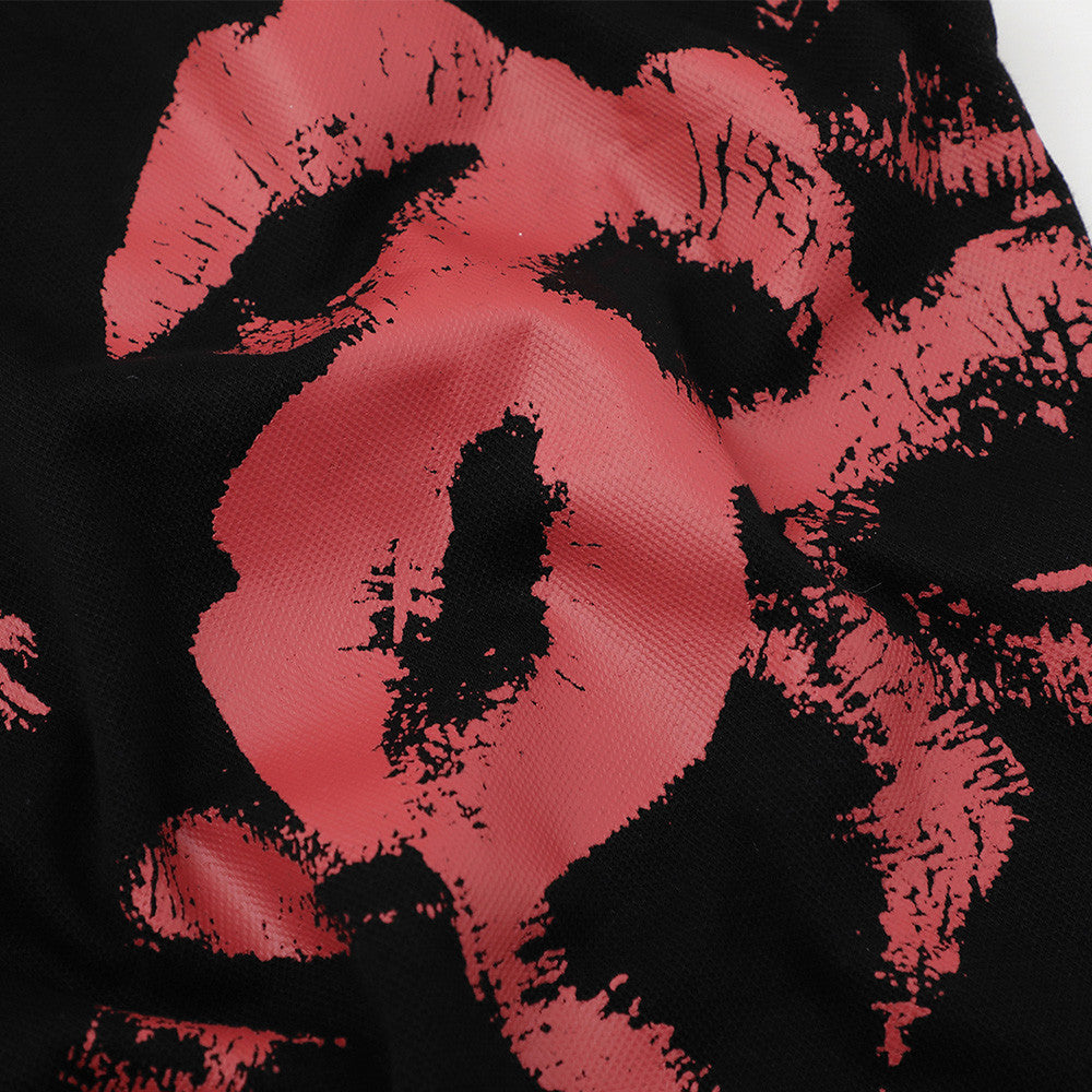 Lip-print loose polo shirt by eprolo in black with pink lips pattern