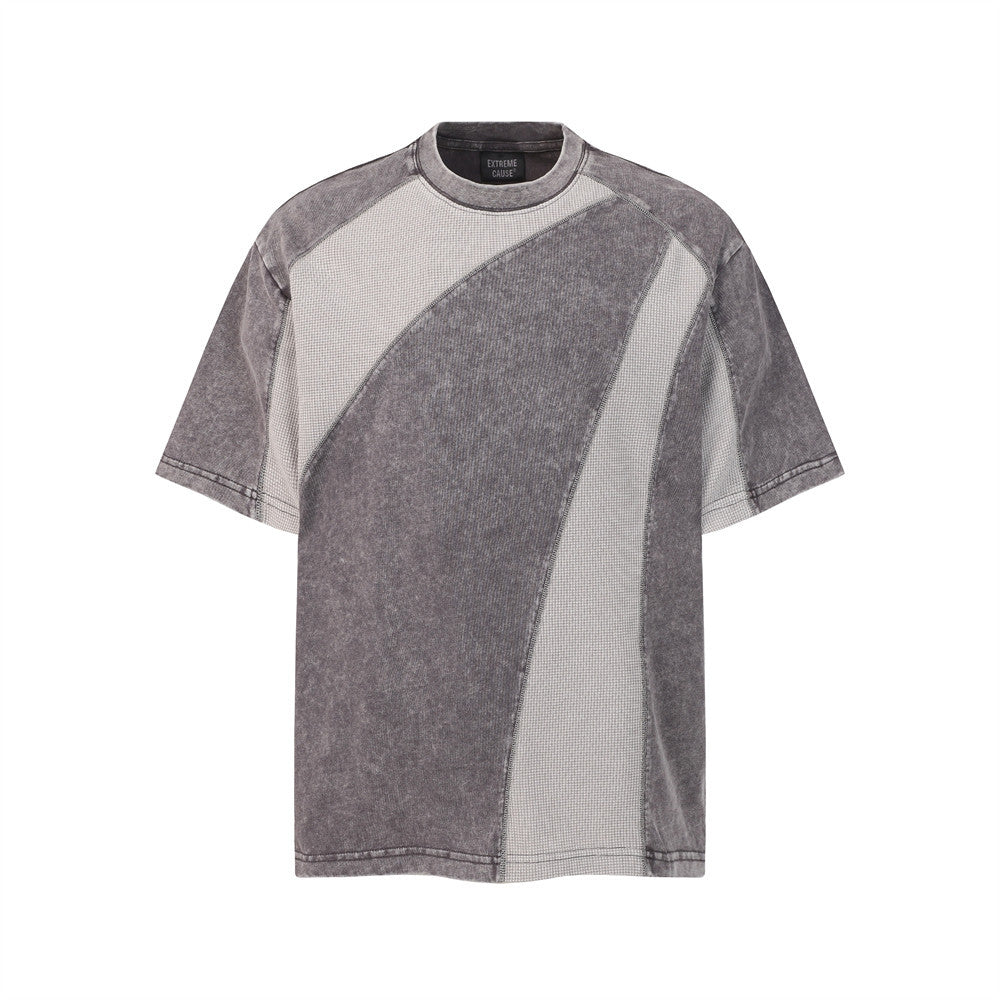 Make vintage washed short sleeve T-shirt featuring bold gray patchwork panels and diagonal color blocks