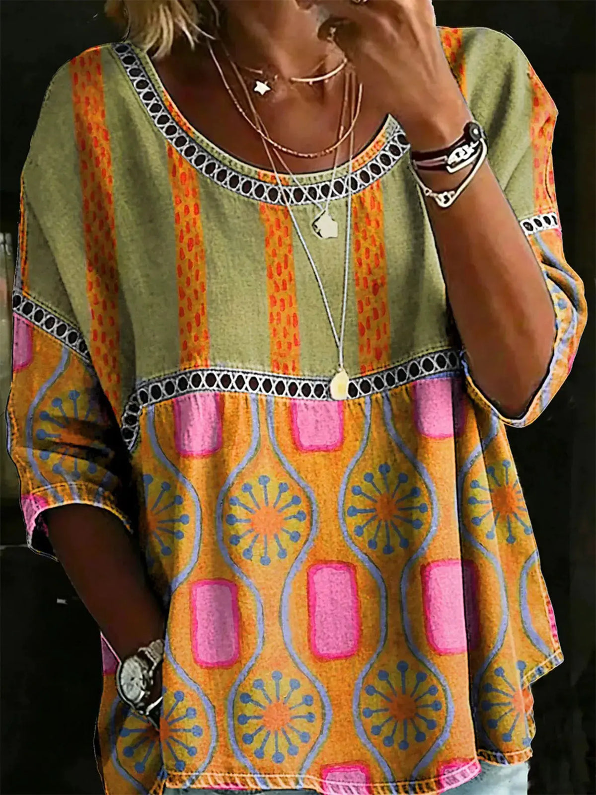 Full Size Hollow Out Round Neck Top Plus Size by Trendsi in olive-green with orange striped boho print