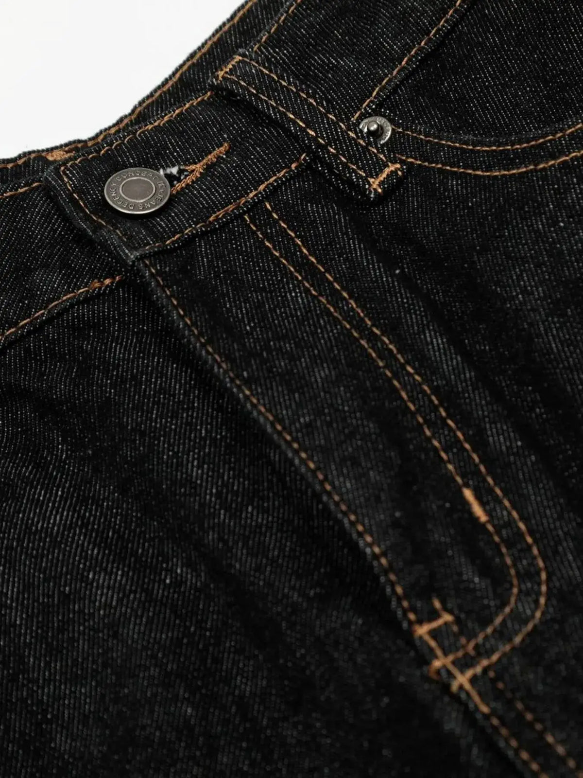 Men's relaxed baggy denim shorts; dark indigo denim with orange contrast stitching and metal rivets.