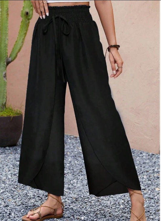 Pantalones Anchos con Cintura Fruncida y Estilo — Ropa de Mujer — Pantalones Superpuestos Cómodos para Vacaciones de Primavera y Verano con Cintura Elástica y Diseño Fluido para un Ajuste Favorecedor