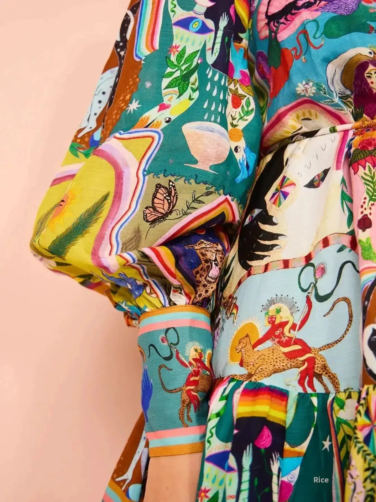 Printed long-sleeve mini dress with belt in vibrant multicolor animal-print motif.