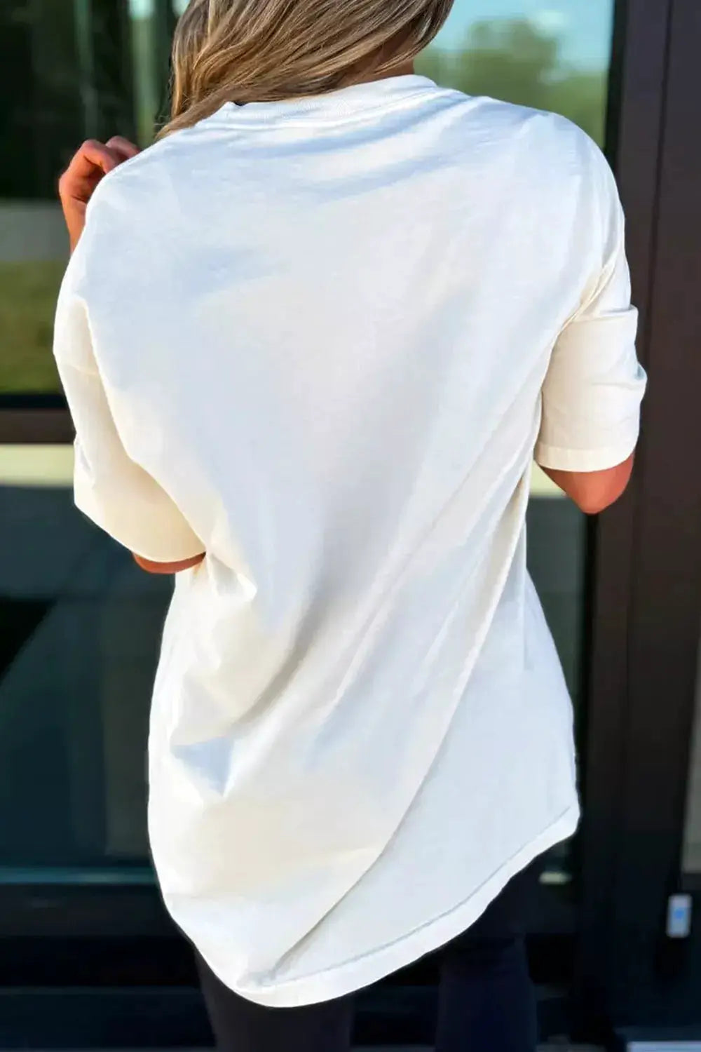 Plus-size white short-sleeve T-shirt, relaxed oversized fit, back view.