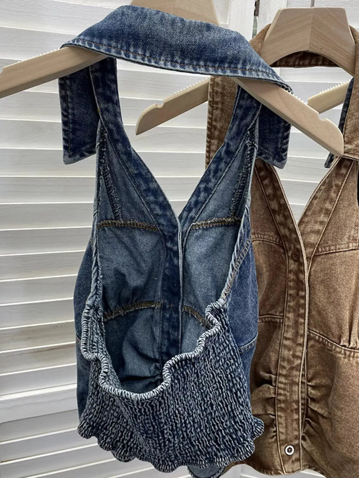 Premium Textured Smocked Denim Halter Top by Trendsi; blue denim with soft spandex blend, 2 pieces on display.