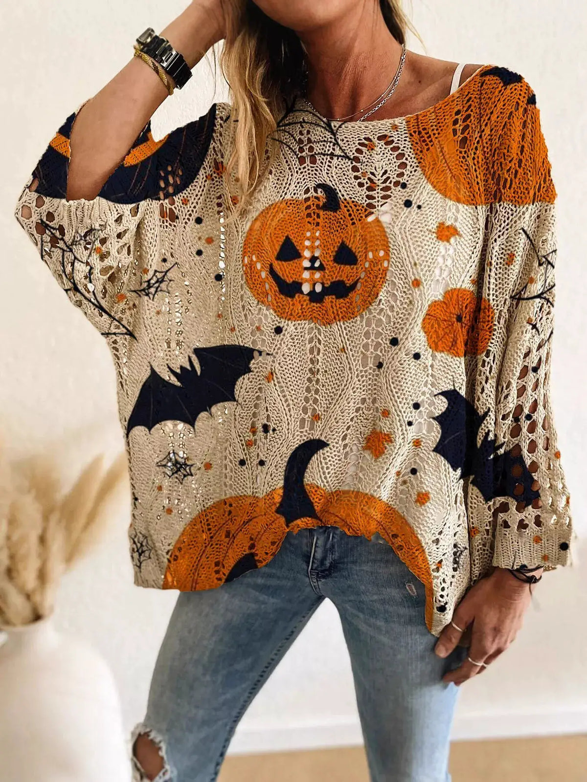 Full Size Halloween Pumpkin Loose Knit Cover Up by Trendsi, beige crochet knit with orange pumpkins and navy bats.