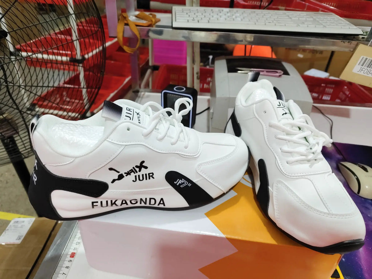 AuraStep height-boosting non-slip men's running sneakers, white with black accents, 2 sneakers shown