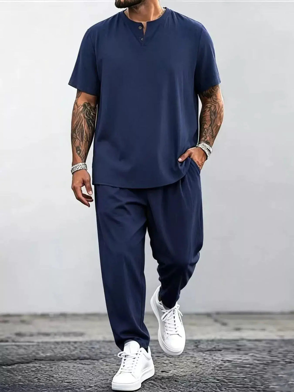 Men's plus-size casual short-sleeve lightweight two-piece set in navy with matching pants.