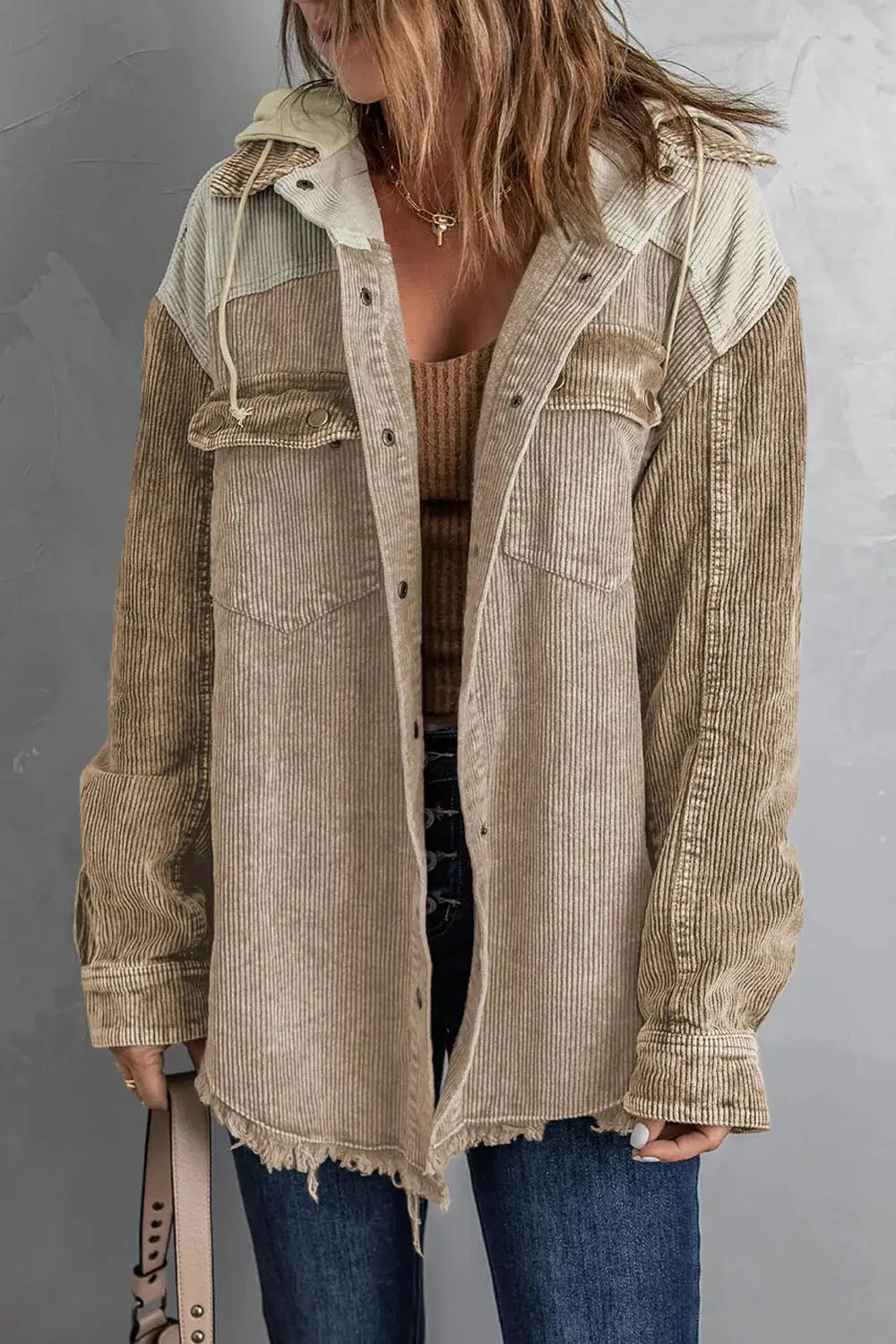 Snap Front Hooded Corduroy Shacket in beige with patch pockets and frayed hem.