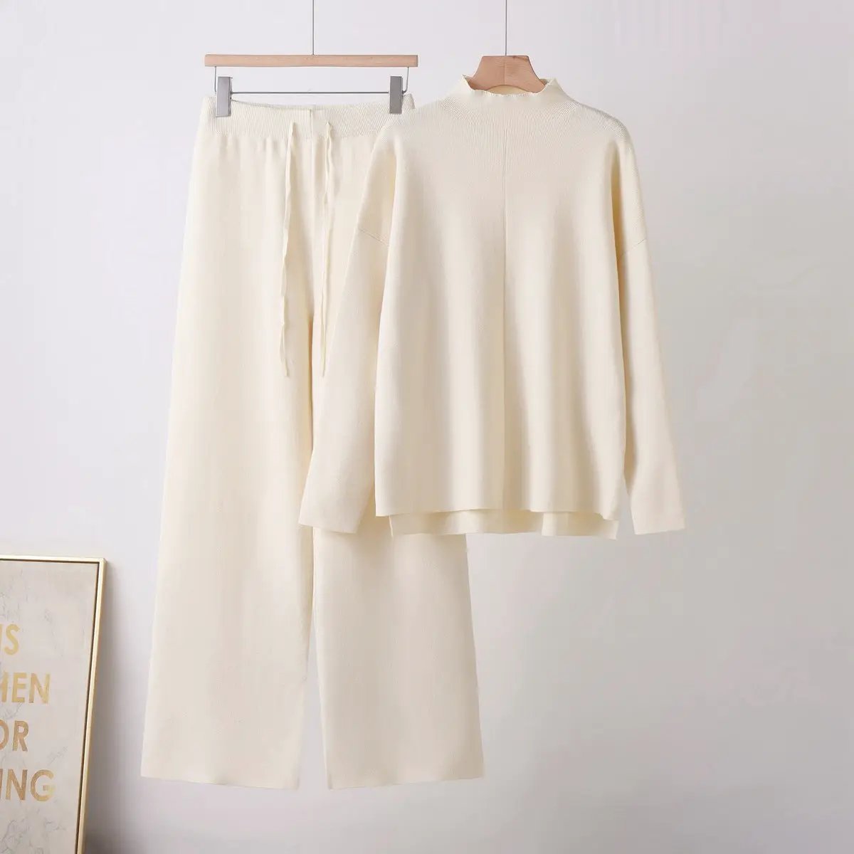 eprolo soft knit two-piece set with stand-up collar and long sleeves in cream; matching wide-leg pants