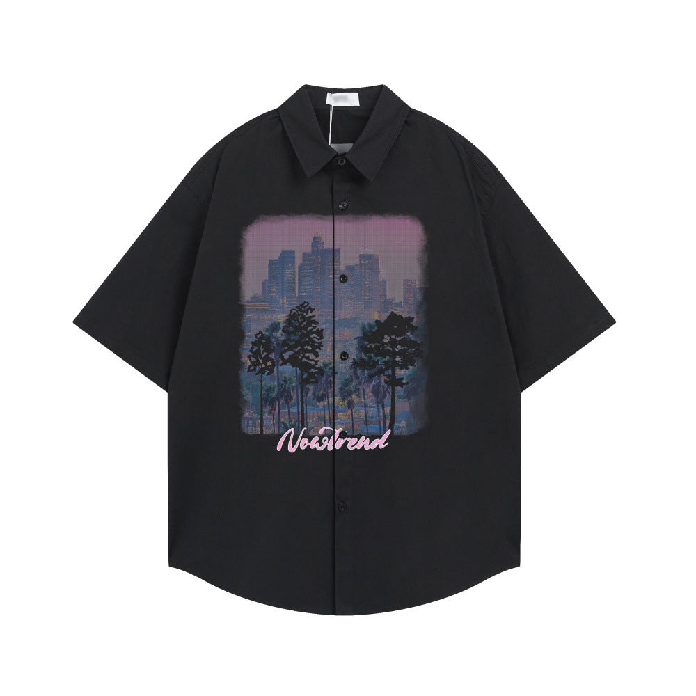 Urban forest printed short-sleeved shirt in black with pink-purple city skyline and trees graphic