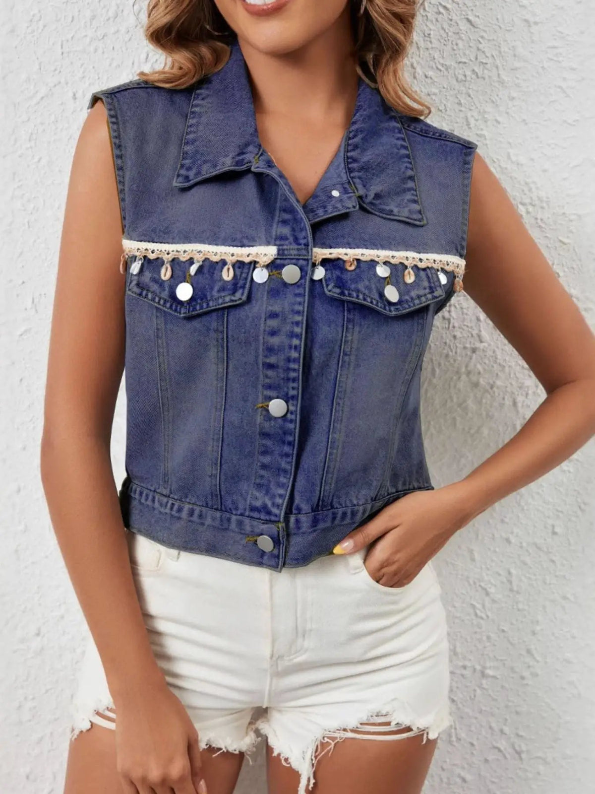 Denim sleeveless button-up layering top by Trendsi, blue with lace trim and silver disc accents.