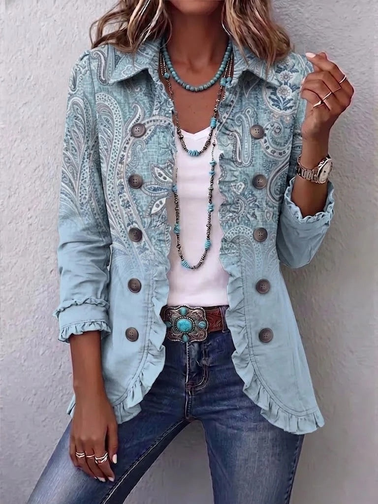 Long light-blue paisley cardigan with button-front and ruffled edges over a white tee.