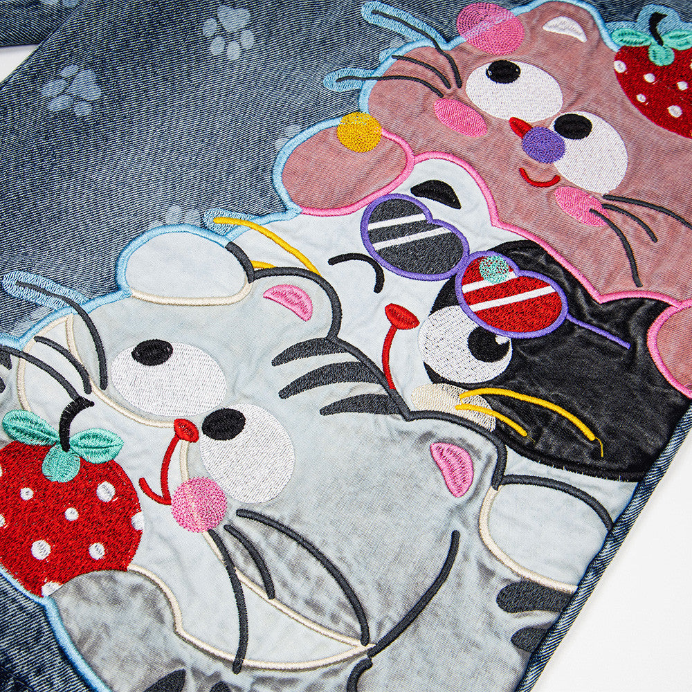 Cat cartoon denim shorts by eprolo, blue denim with colorful embroidered cats and strawberries, street fashion pattern