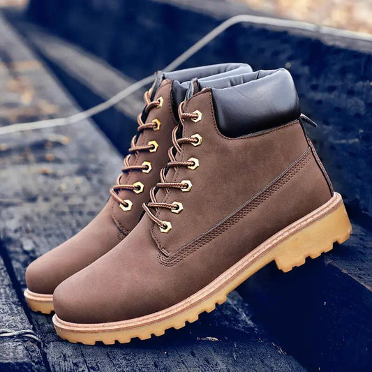 Pair of AdTec Celestia high-top snow boots, brown leather with extra thick insulation and tan lug sole