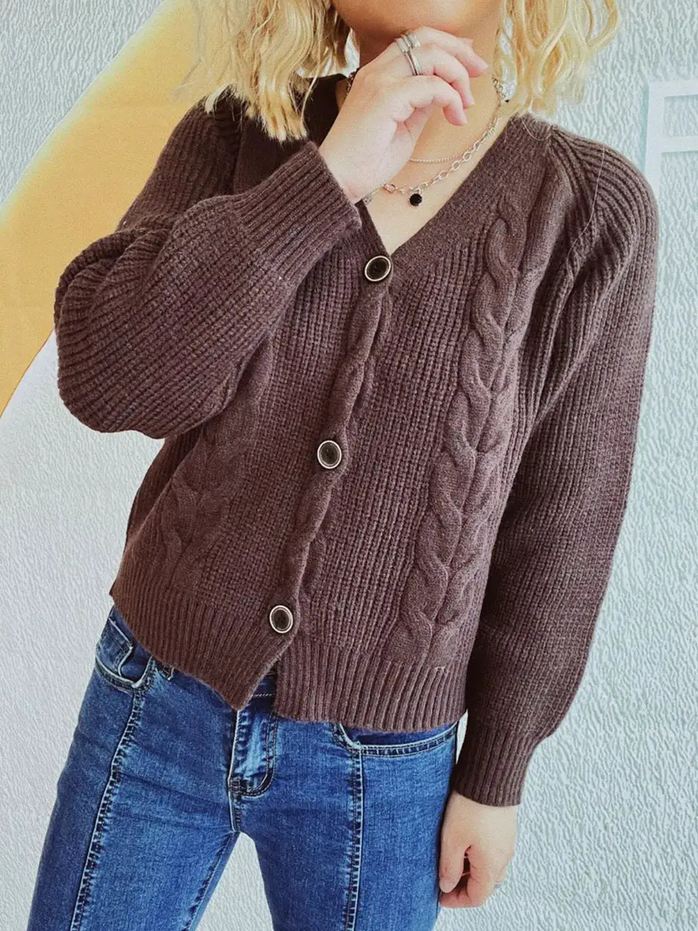 Trendsi soft cable-knit V-neck button-front cardigan in brown with long sleeves.