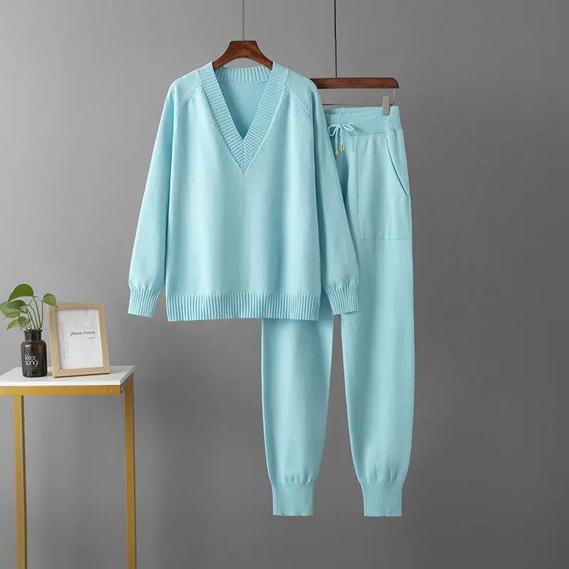 Classic V-neck sweater and pants two-piece set in light blue by eprolo; soft breathable knitwear.