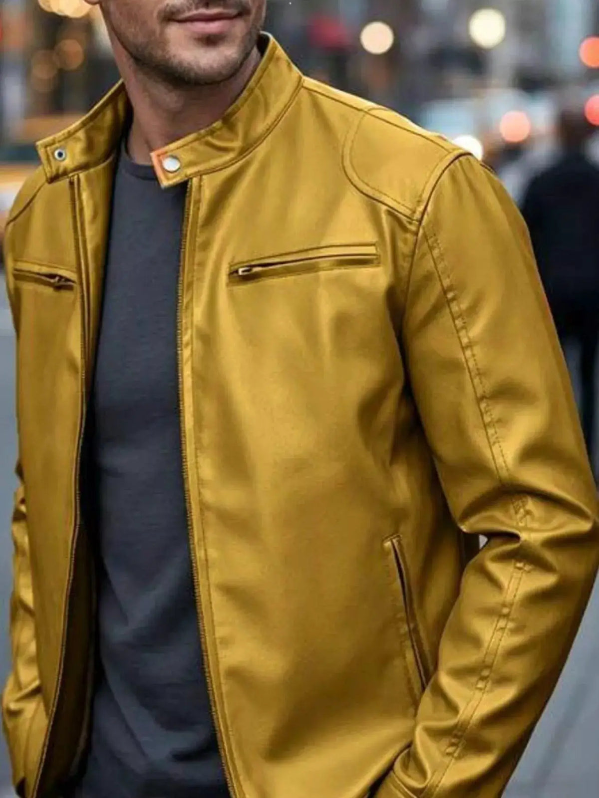 Men's plus-size gold faux-leather bomber jacket with zip pockets and stand collar with snaps.