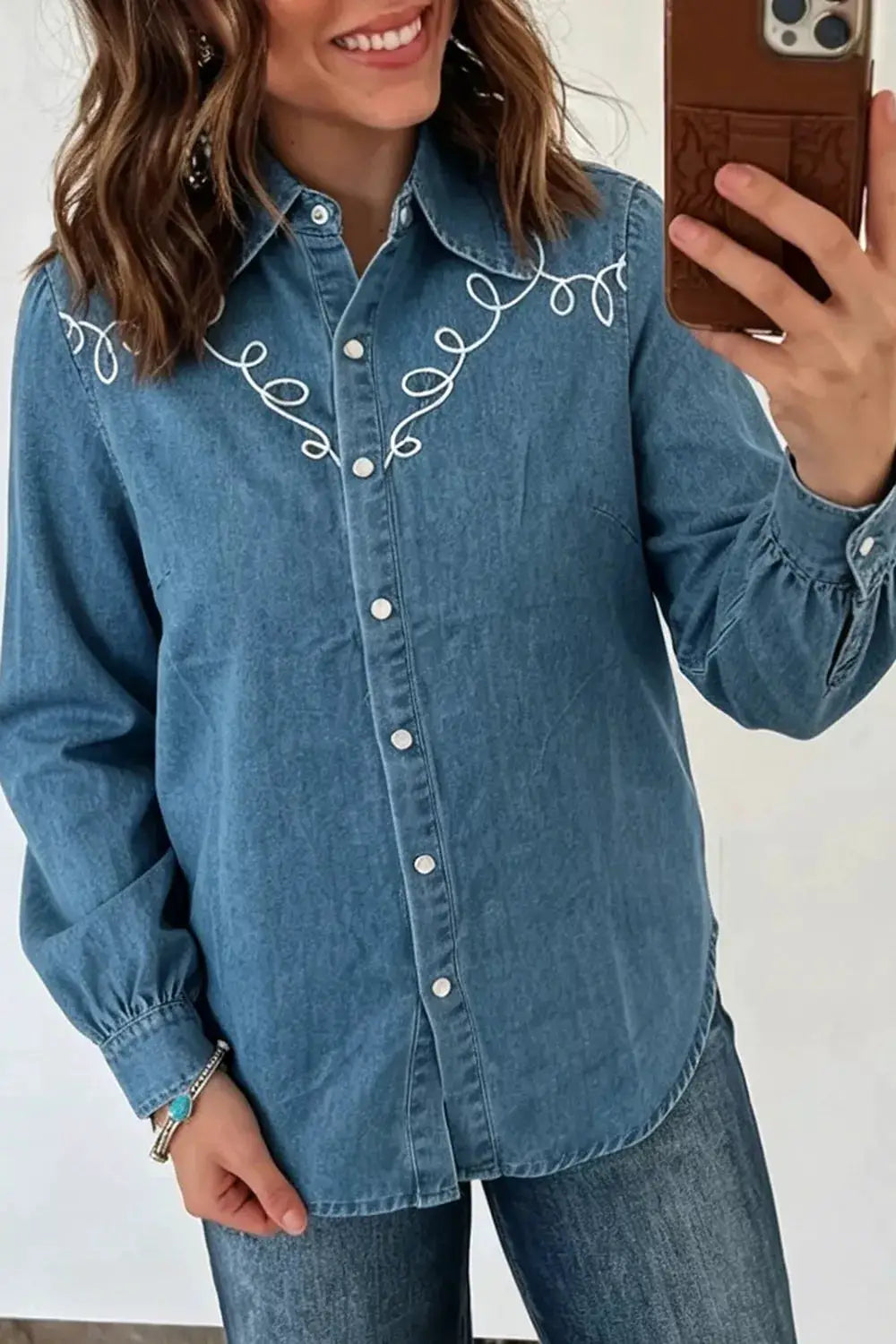 Embroidered Western Denim Top by Trendsi, blue denim with white scroll embroidery and button-front.