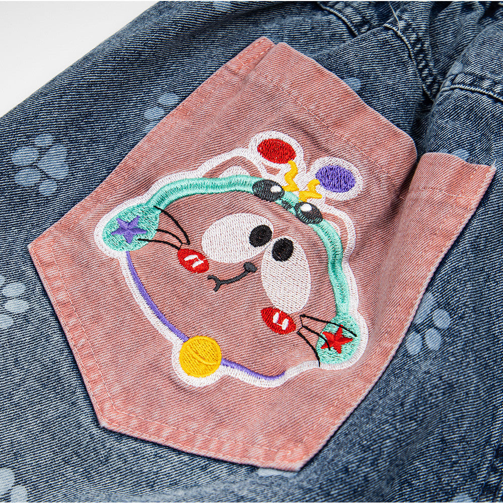 Cat cartoon embroidery on pink pocket of blue denim shorts by eprolo, street fashion