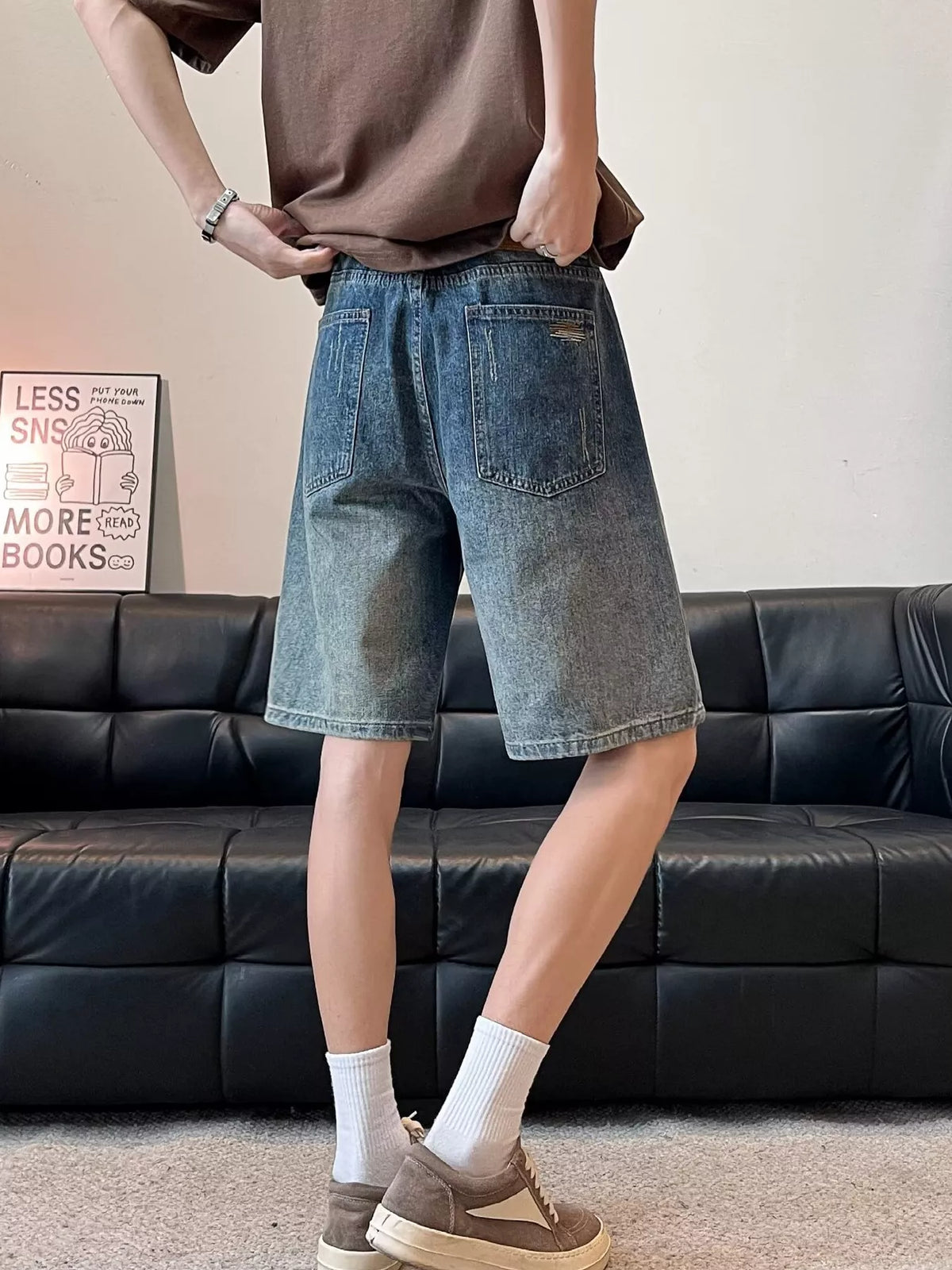 Men's plus-size wide-leg washed denim shorts with cotton-stretch fabric and back pockets