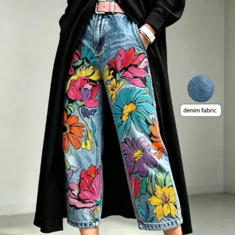 Capri jeans by AdTec in green with bold floral print; denim fabric, mid-rise, wide-leg