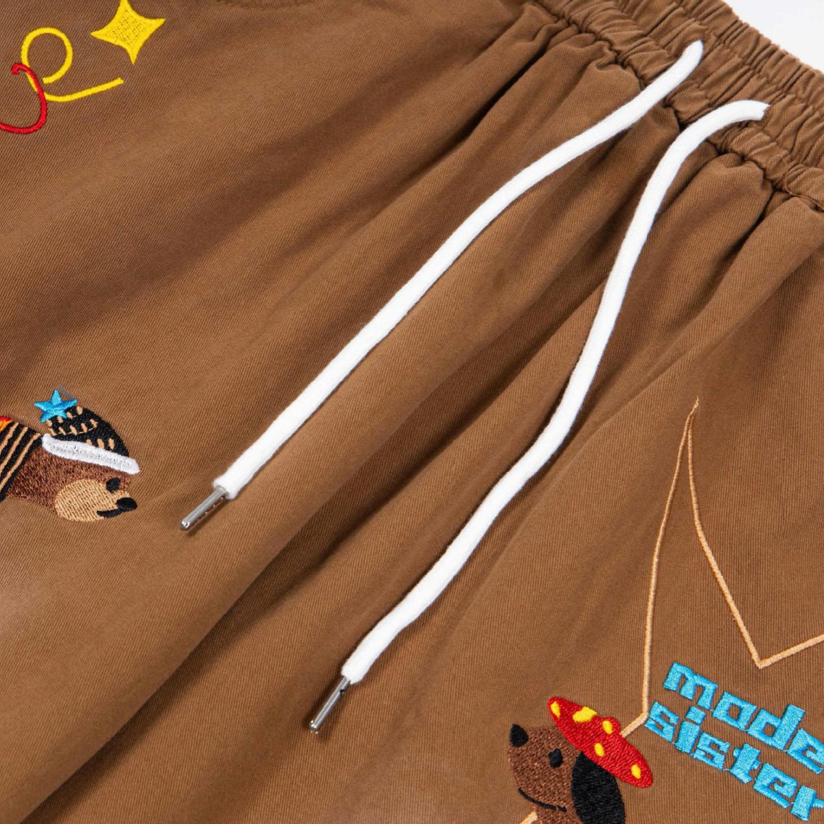 Star Puppy Patchwork Embroidered Multi Pocket Jeans, brown with white drawstrings and teddy bear patches by eprolo