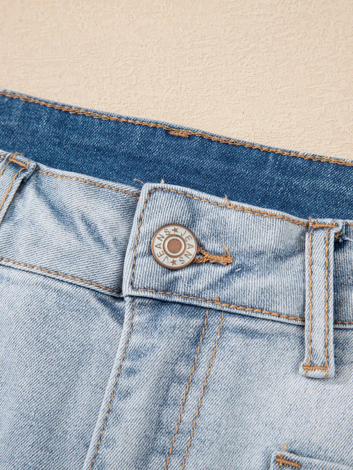 Denim shorts, high-rise with two-tone blue wash and metal button detail