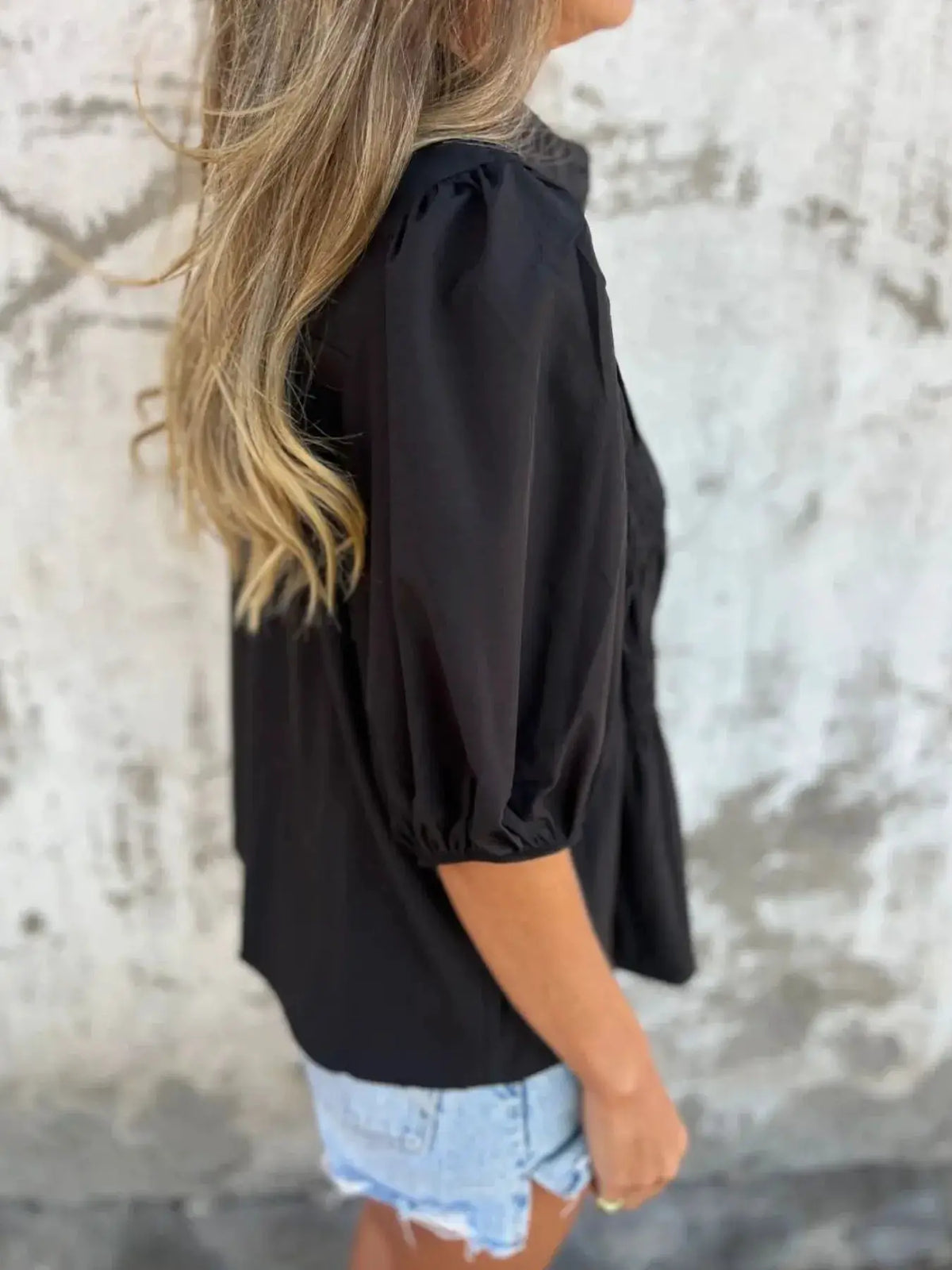 Full-size black smocked puff-sleeve blouse by Trendsi, plus-size.