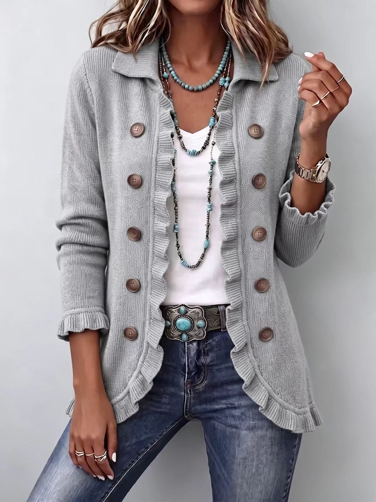 AdTec long gray cardigan with knit texture, double-breasted brown buttons and ruffled front.