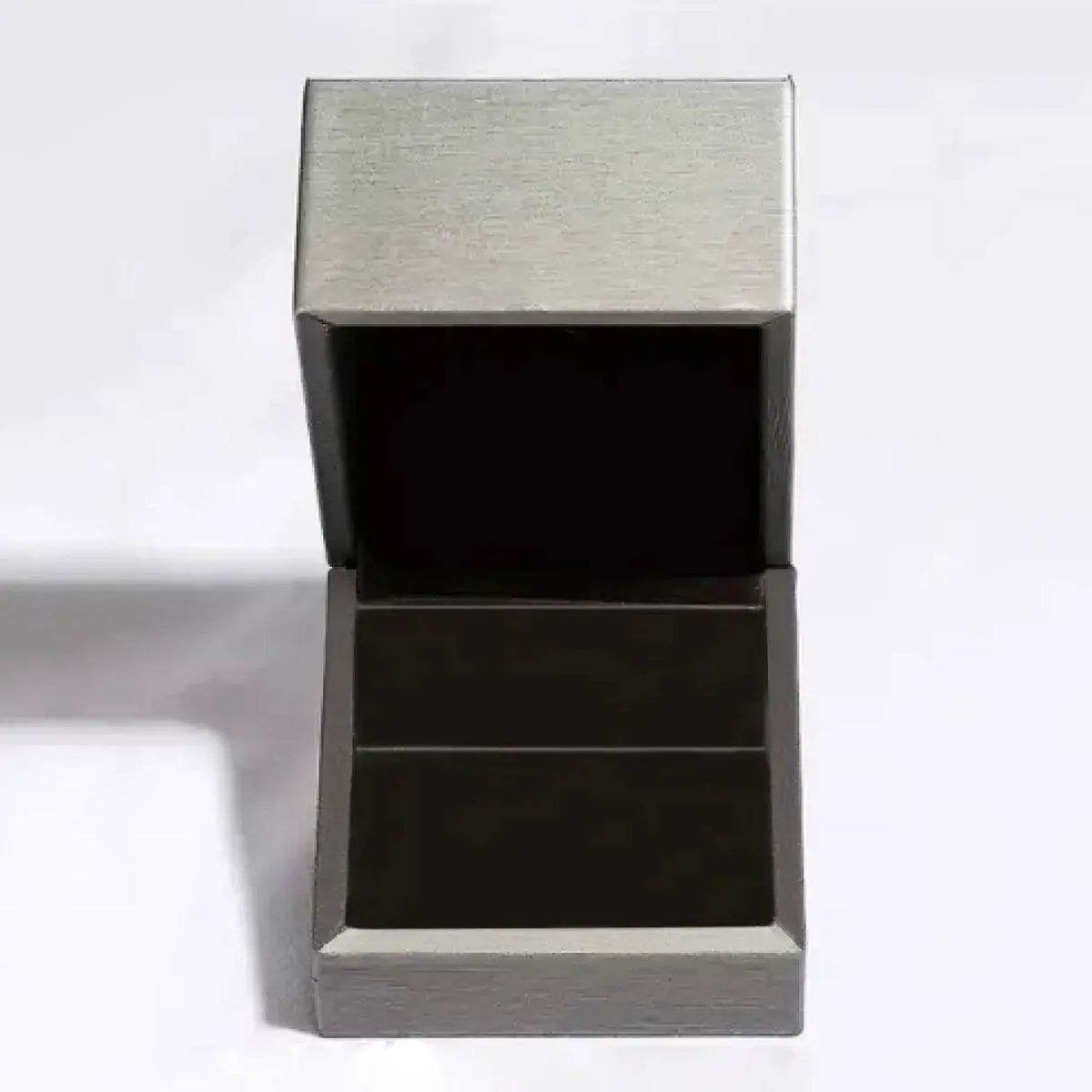 2 Carat Moissanite 925 Sterling Silver Ring in a silver-toned jewelry box with a black interior