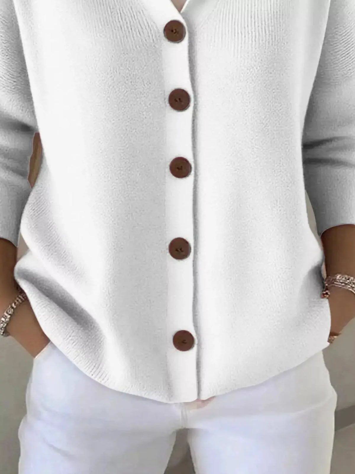 Plus-size white knit cardigan with brown front buttons