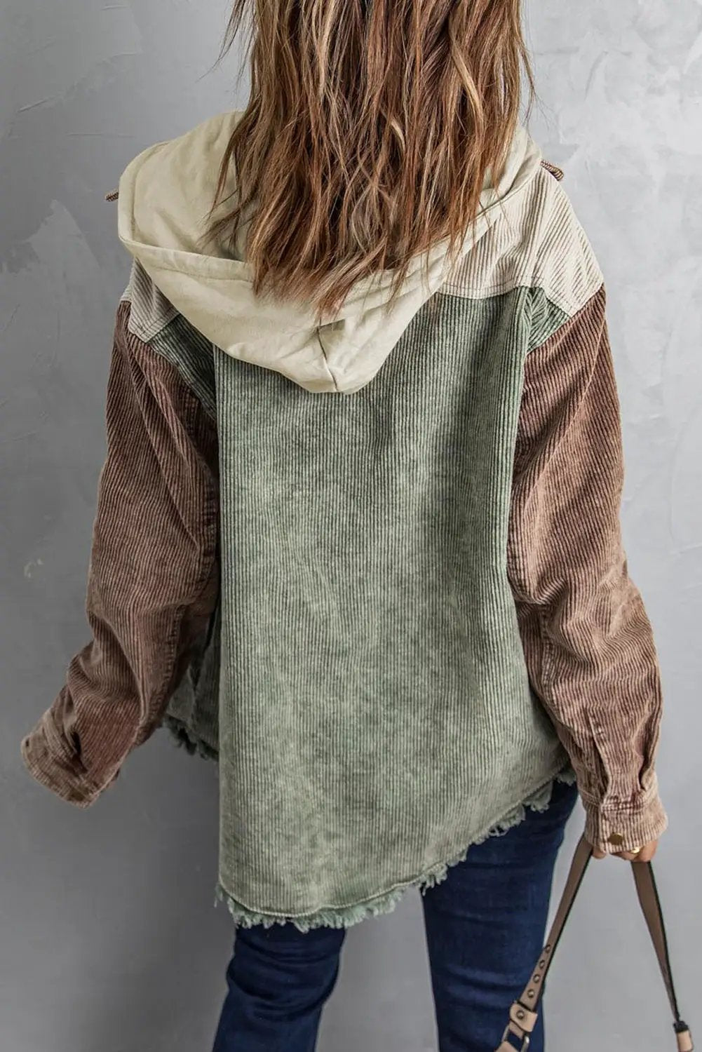 Snap-front hooded corduroy shacket by Trendsi; color-block green body with brown sleeves