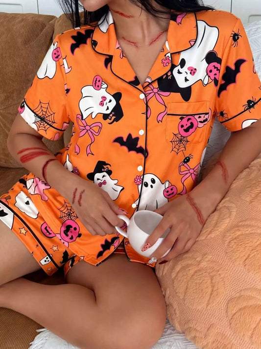 Trendsi Halloween ghost-print pajama set: orange button-down top and matching shorts