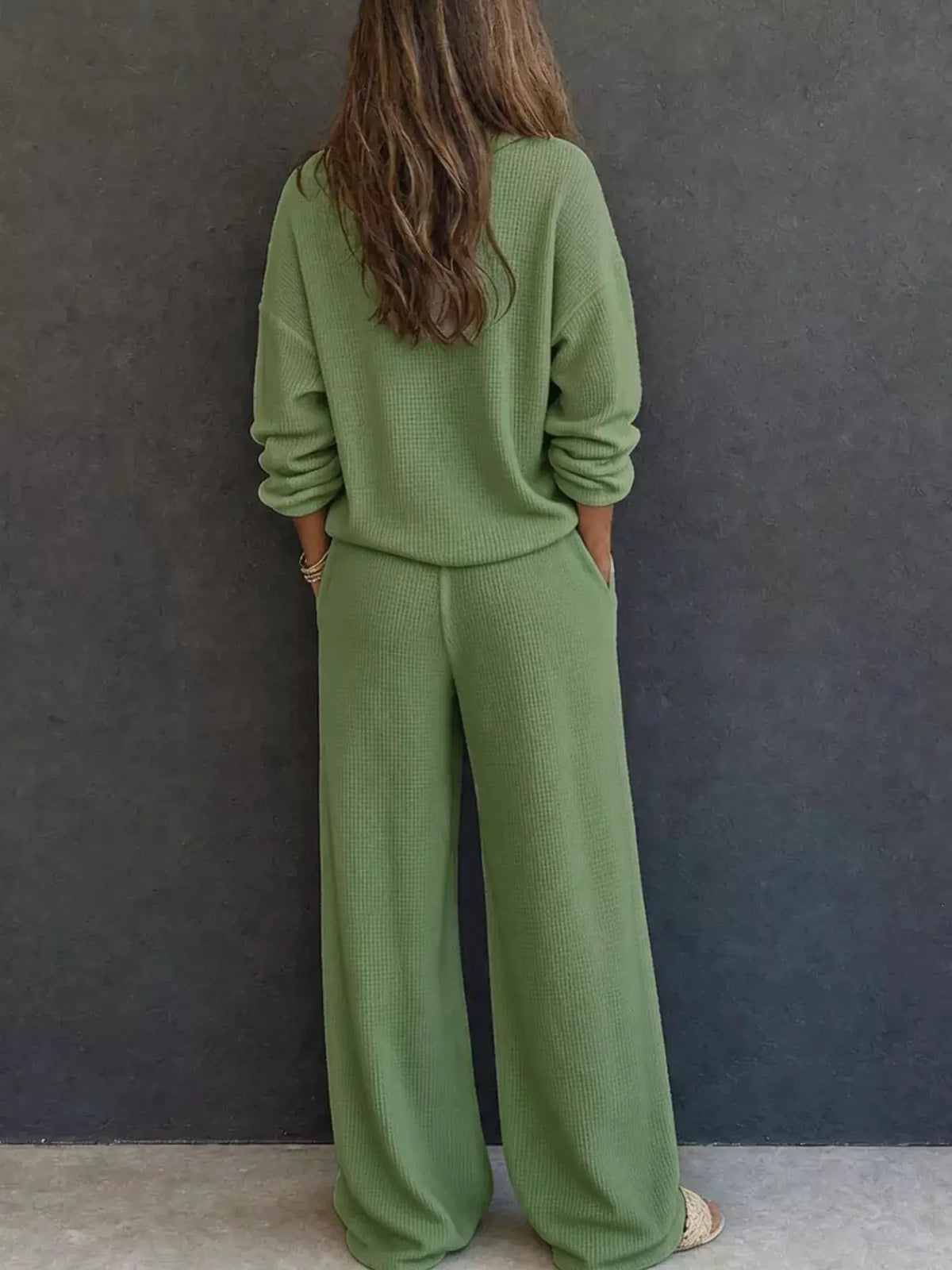 Waffle-knit henley top and wide-leg pants set in sage green, back view.