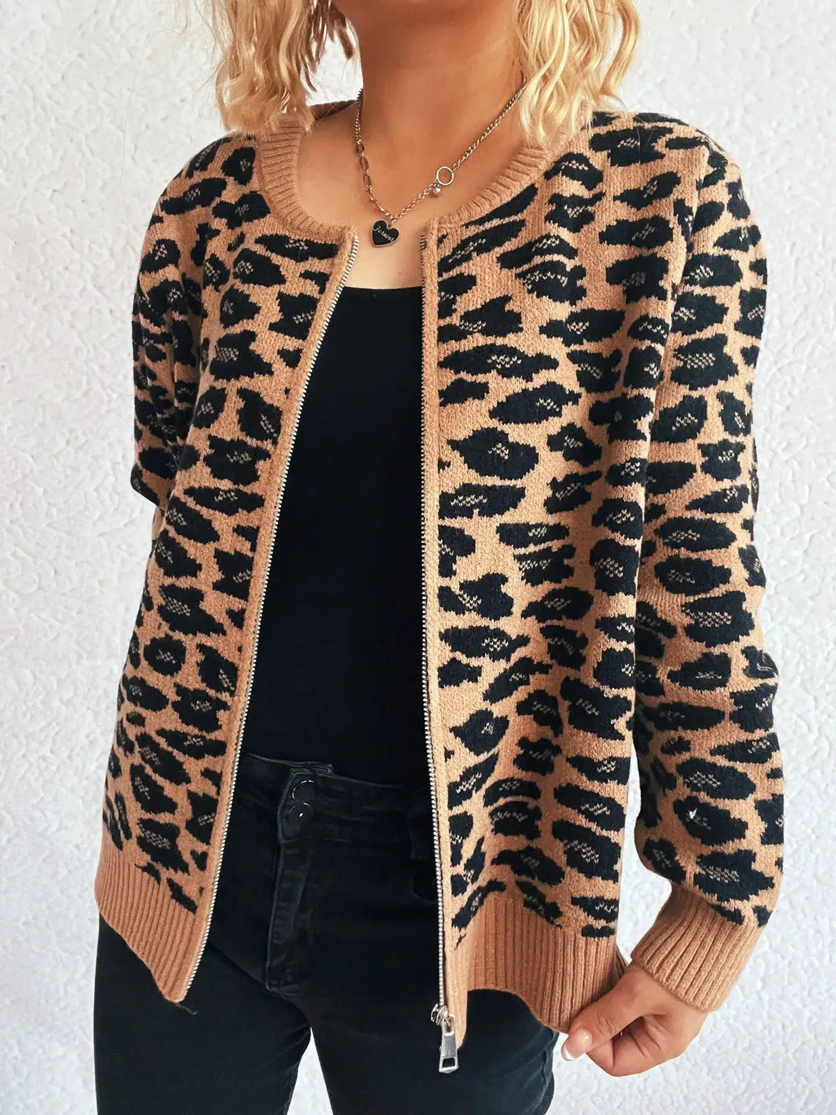 Zip-Up long sleeve cardigan with camel leopard print; zip front and ribbed cuffs.