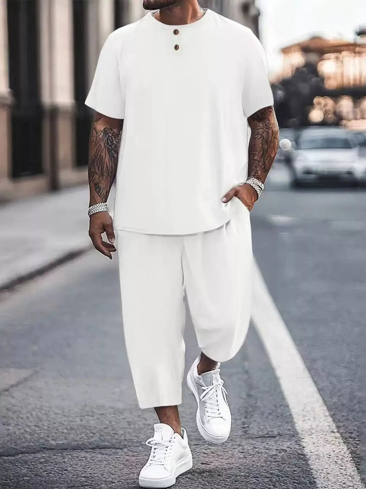 Men's plus-size casual white two-piece set with short-sleeve top and cropped wide-leg pants