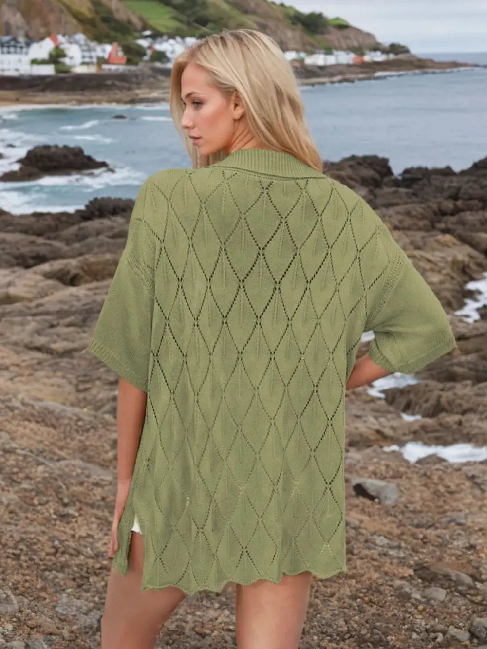 Womens button-down eyelet knit shirt in olive green with short sleeves, collared neck, loose fit, scalloped hem