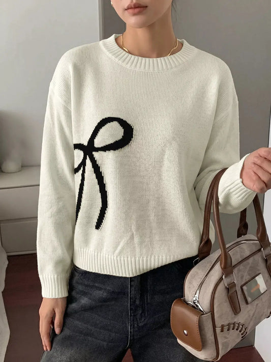 Bow graphic white acrylic sweater by Trendsi, round-neck with soft stretch fit
