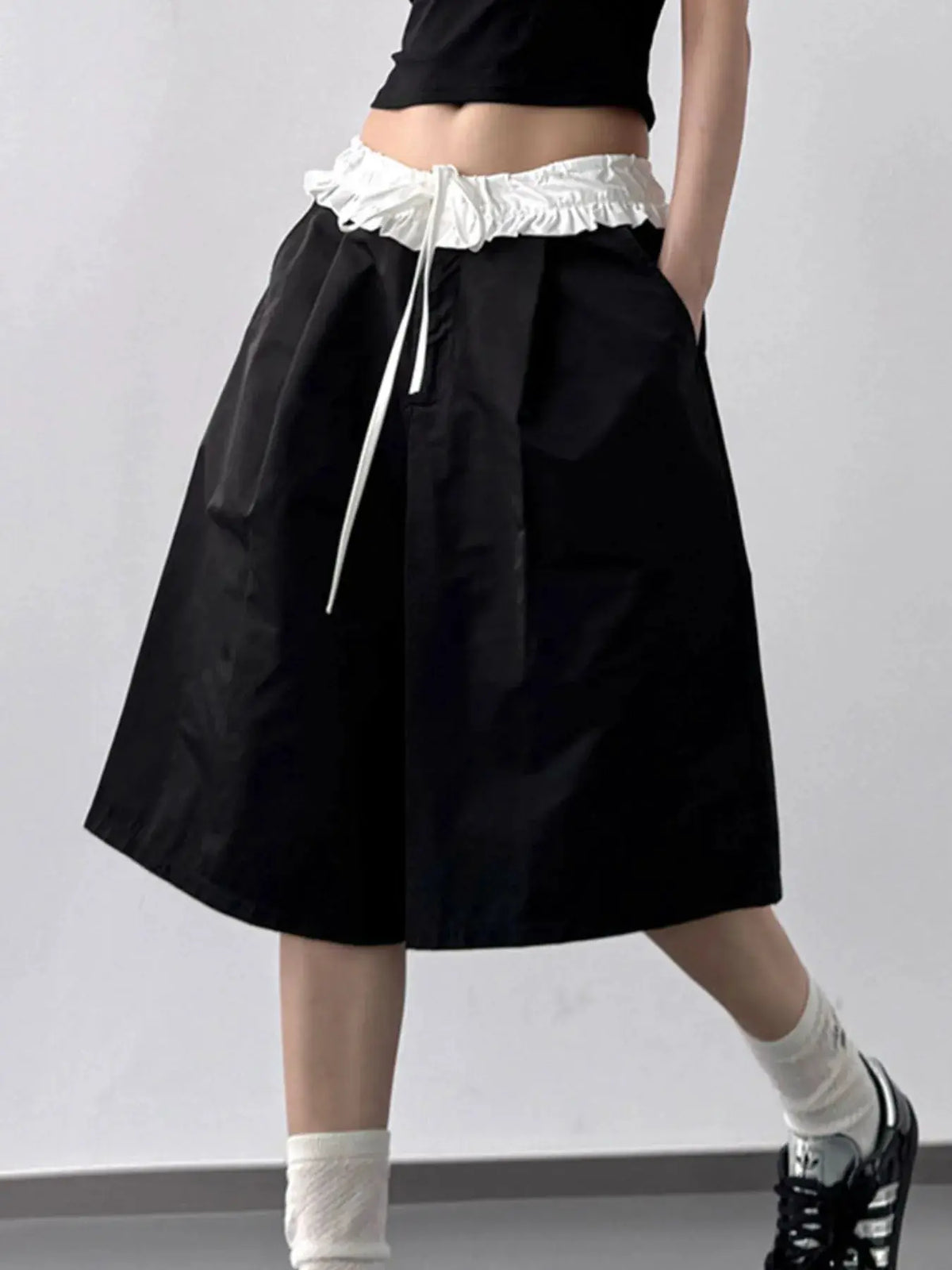 Contrast Waistband Wide-Leg Shorts by Trendsi; black wide-leg shorts with white ruched waistband and drawstring