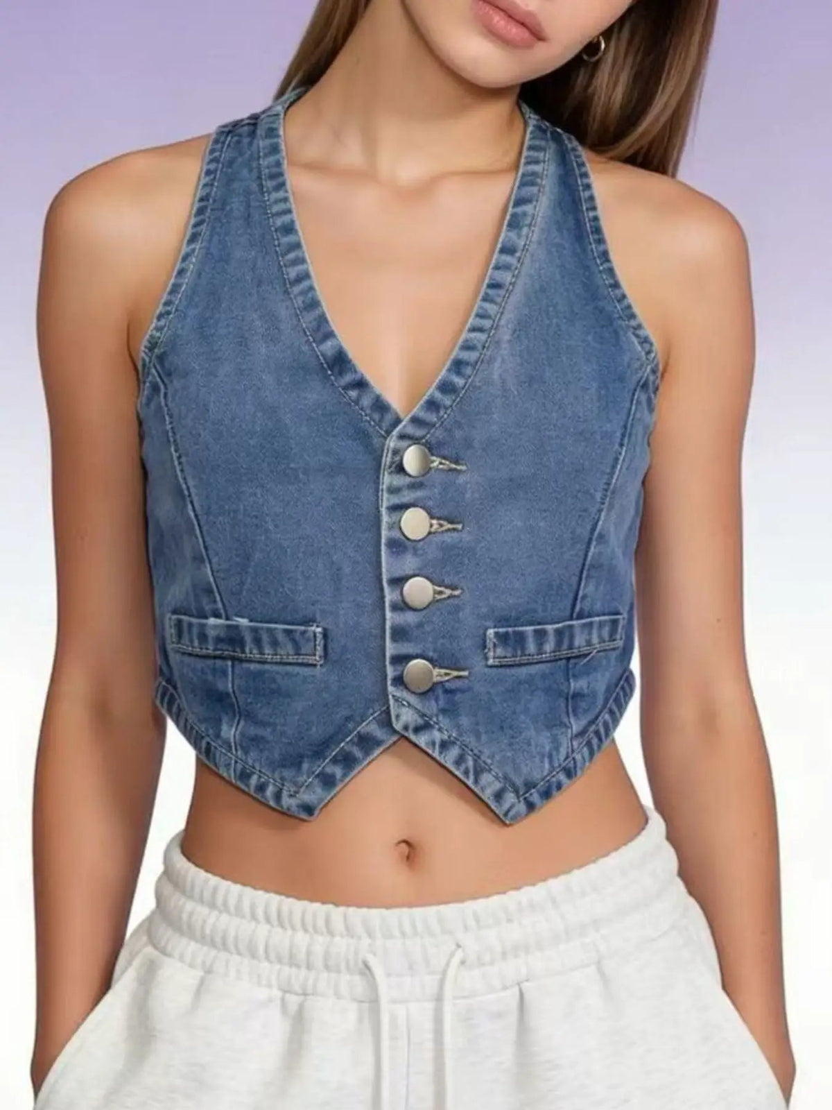Classic button-down denim vest, cropped light-blue cotton-blend fabric with front metal buttons and two pockets