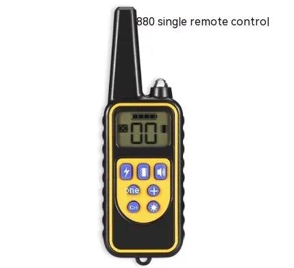 Dog training remote control by AdTec, black and yellow handheld device with LCD display
