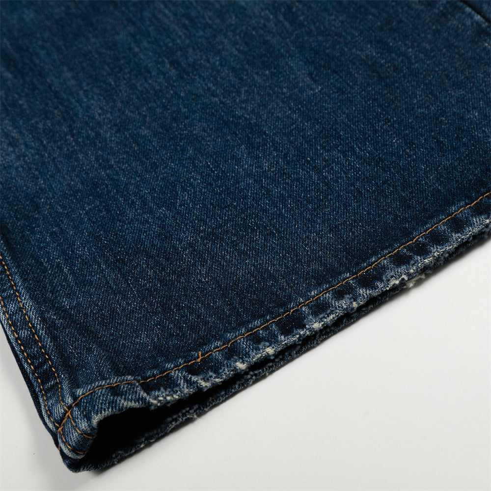 Washed denim straight-leg pants by eprolo; dark blue fabric with orange-stitched hem