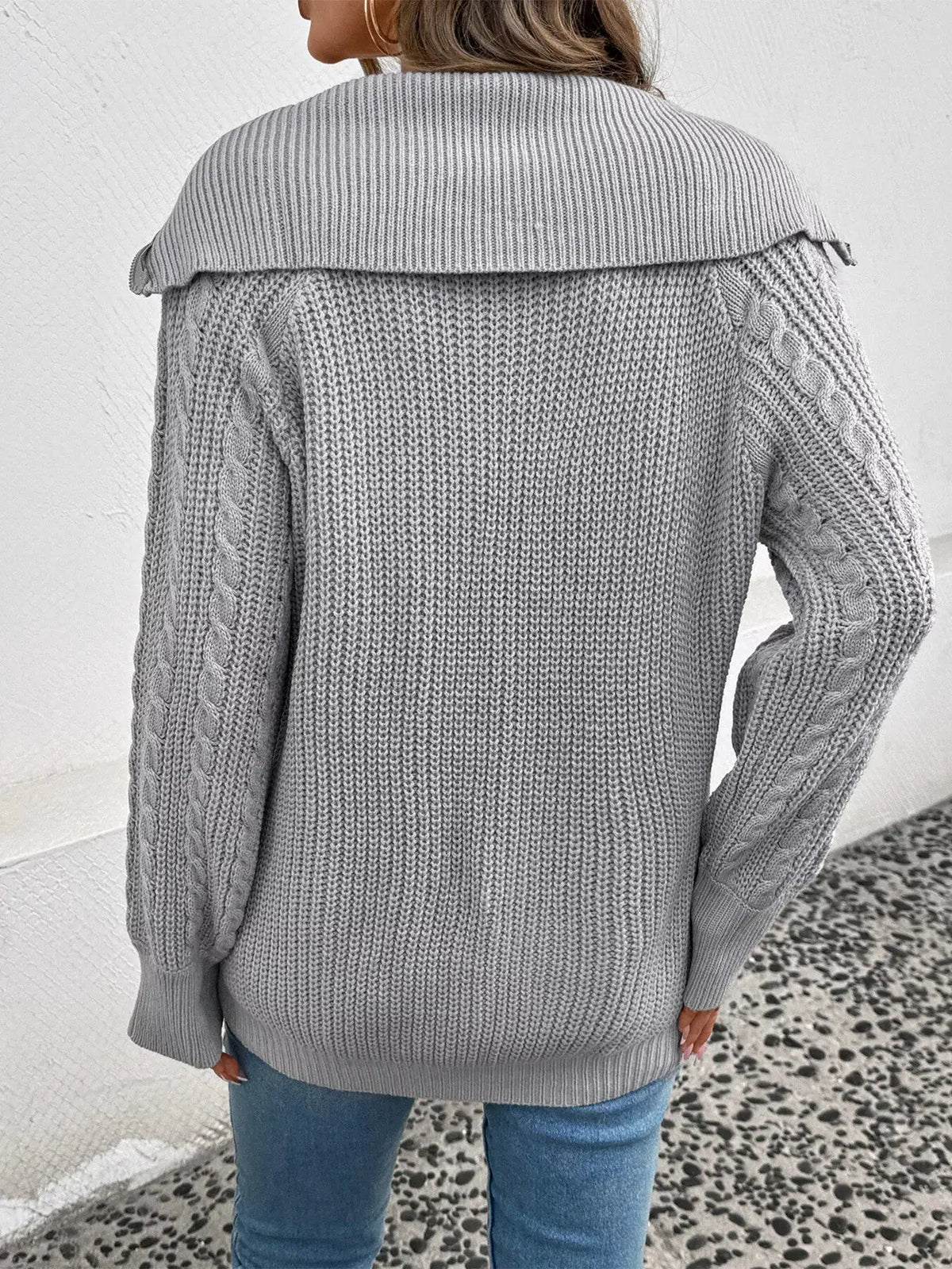 Cable Knit Half Zip Sweater by Trendsi in light gray acrylic; oversized with a wide ribbed collar.