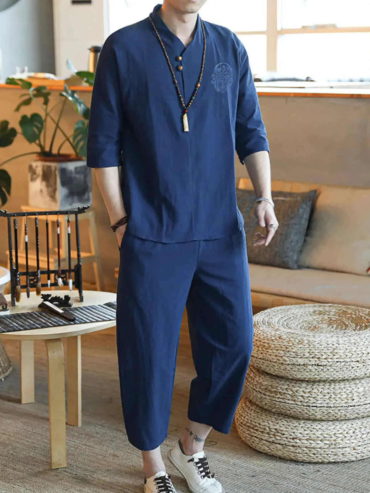 Men's plus-size three-quarter sleeve top and pants set in navy blue, casual loungewear ensemble.