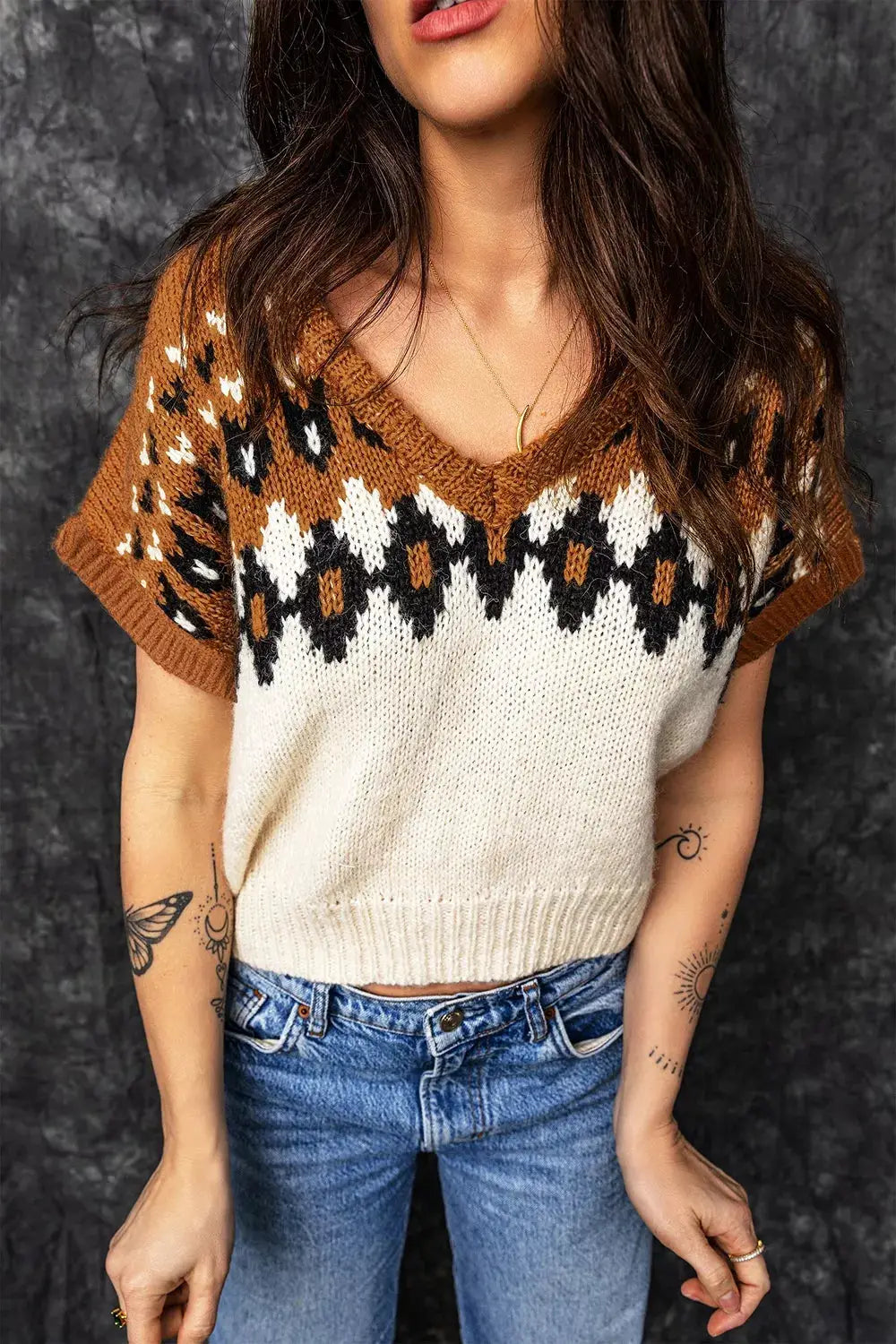 V-neck short-sleeve knit geometric sweater in brown, black, and ivory